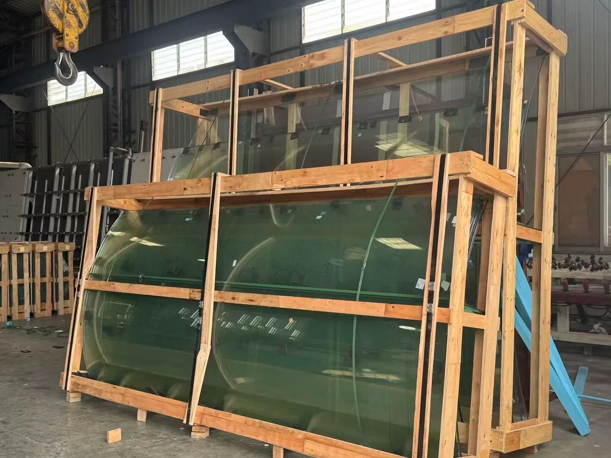 Curved glass panels in timber packing frames for the Tobago project